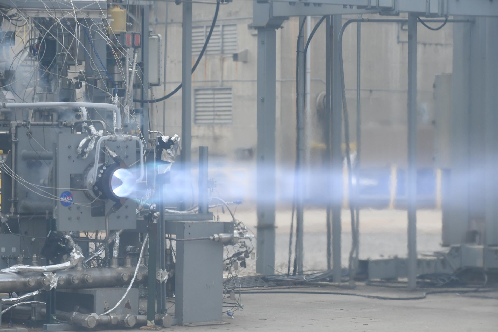 A 3D-printed rotating detonation rocket engine under test at NASA — additive manufacturing is also central to Galactic Energy's CQ-50 thrust chamber