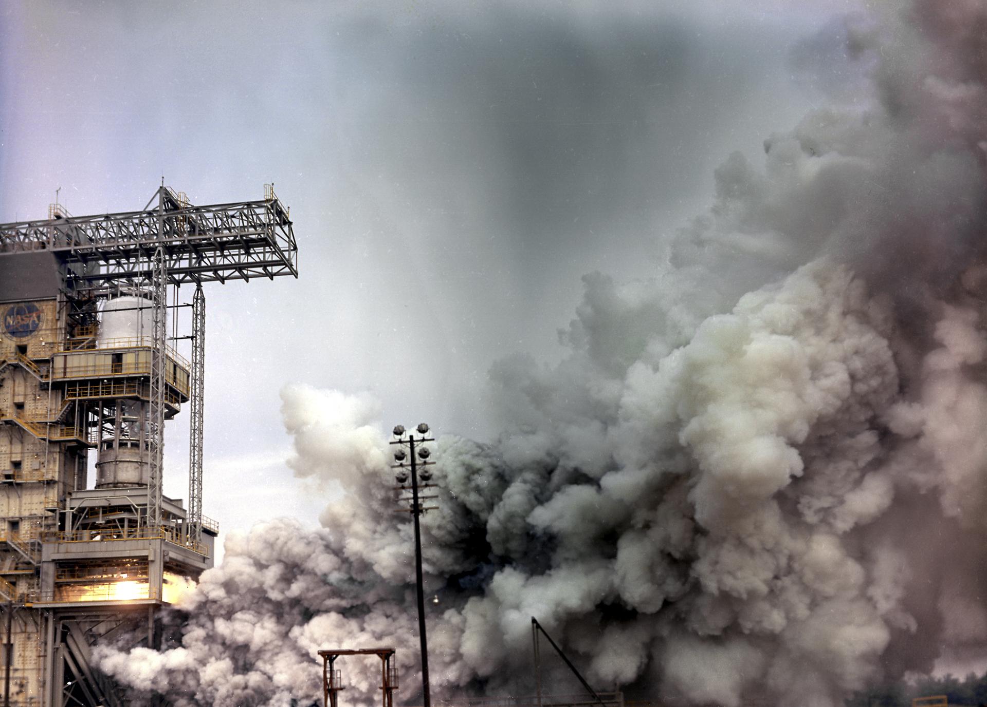 Static firing of a Saturn F-1 engine at the Marshall Space Flight Center — the American single-chamber answer to combustion instability (NASA)