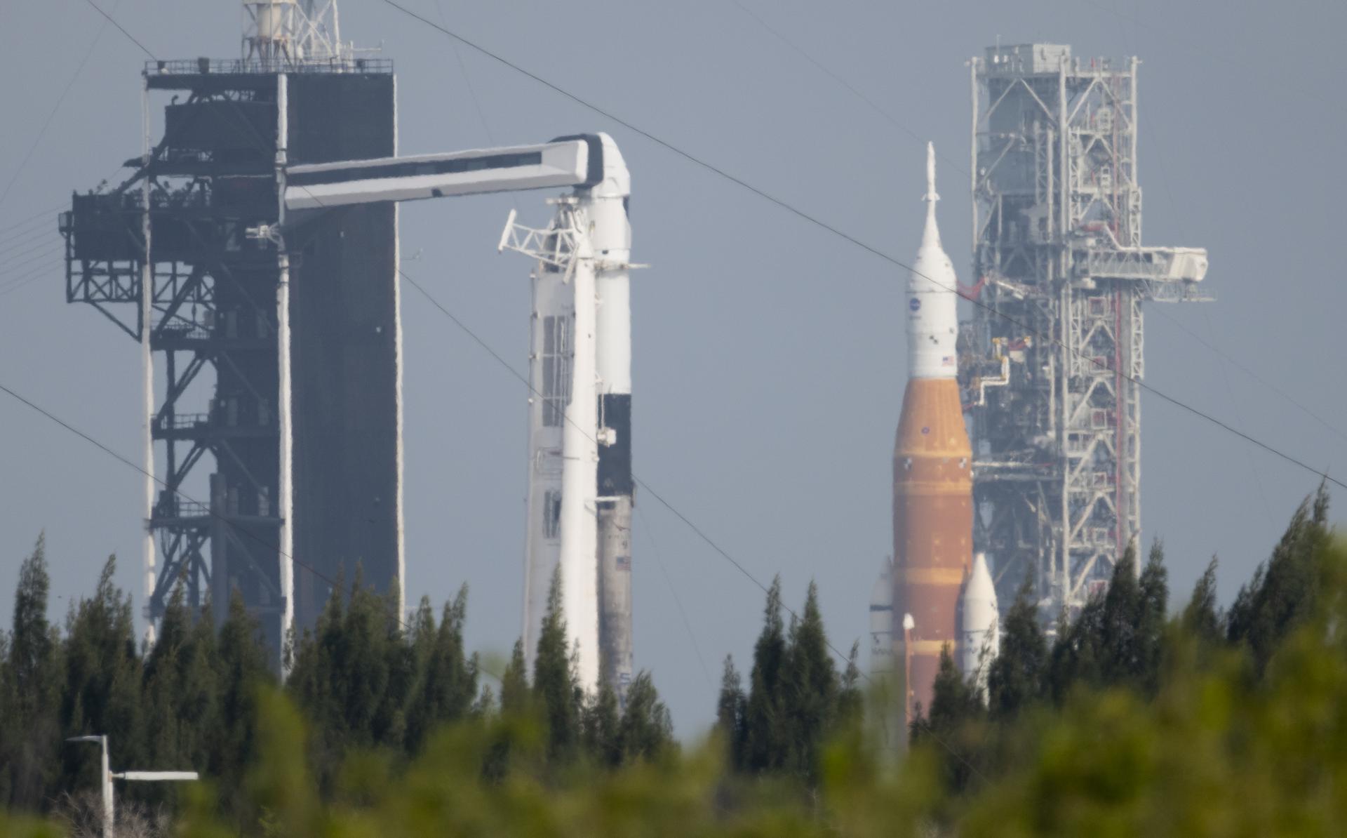 Falcon 9 at Launch Complex 39A with NASA's SLS at Pad 39B in the background